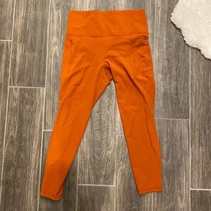 Athleta Salutation Stash Pocket 7/8 Tight